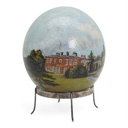 Stella Reading - Ostrich egg painted with a view of Copgrove Hall with the stables and grounds and on a plated stand, signed and dated 1985 H16cm overall