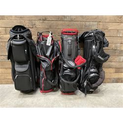 Four golf bags - Mizuno, H2NO, Fitleist and Big Max