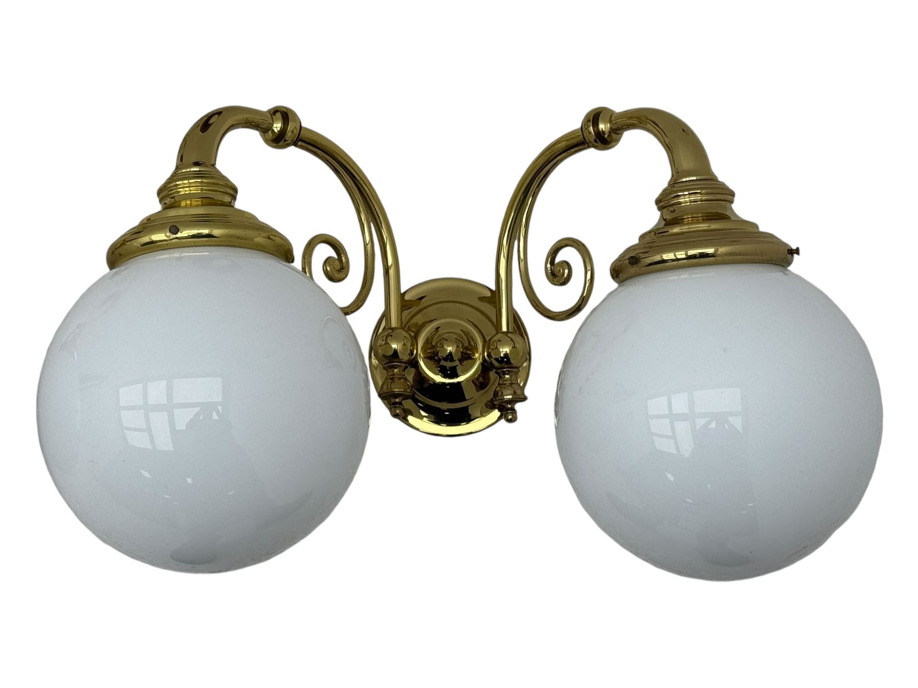 Two brass double-arm wall mounted lights, each with frosted glass globes and scrolled arms (W50cm, D26cm, H31cm); matching central double-arm light with candle-style fittings (W42cm, D24cm, H22cm)