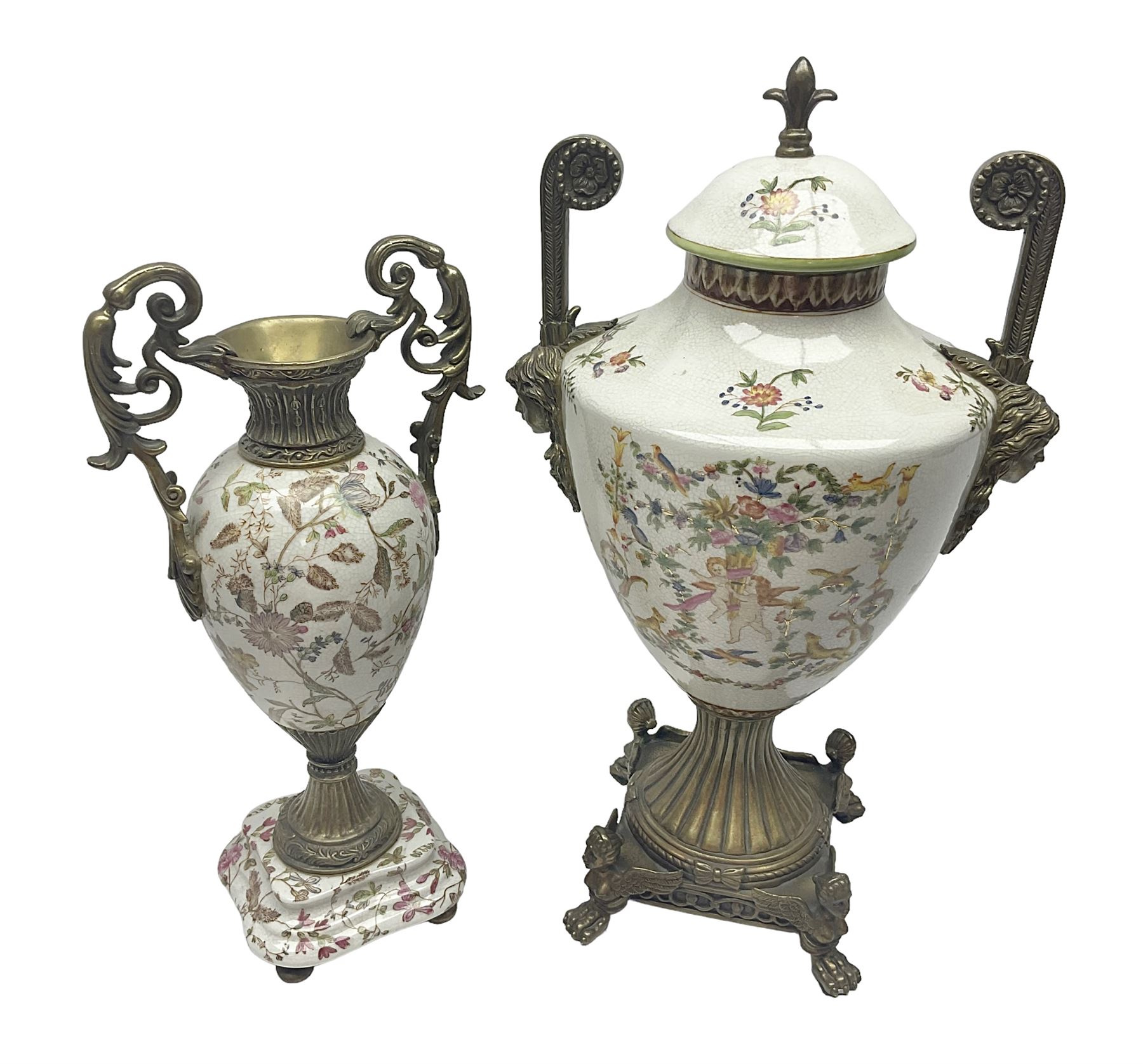 Wong Lee, twin handled ceramic urn with enamelled floral decoration and bronzed metal mounts, upon a square base, marked to base, together with similar twin handled urn with enamelled Cherub decoration, largest H44cm