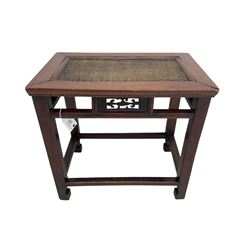 Pair of early 20th century Chinese hardwood side tables, each with rectangular woven cane top, pierced frieze with foliate motif, square supports joined by cross-stretchers