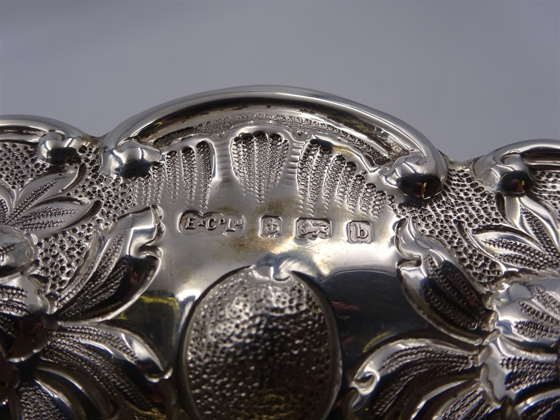 Edwardian silver pedestal bowl, of circular form, with shaped C scroll rim, embossed with floral and foliate decoration throughout, upon a circular foot, hallmarked Elkington & Co Ltd, Birmingham 1901, H9.5cm, D25cm