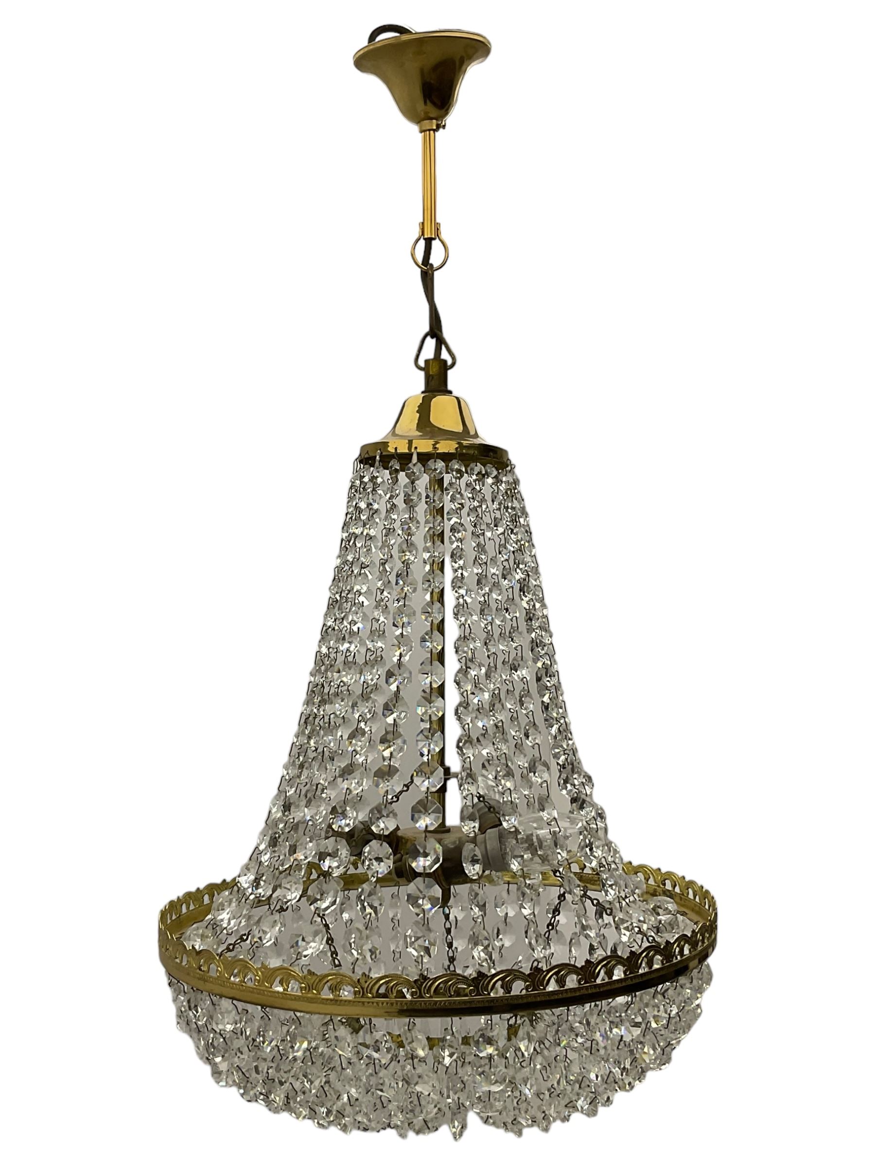 Gilt metal chandelier, circular form with glass bead pendants, three branches 