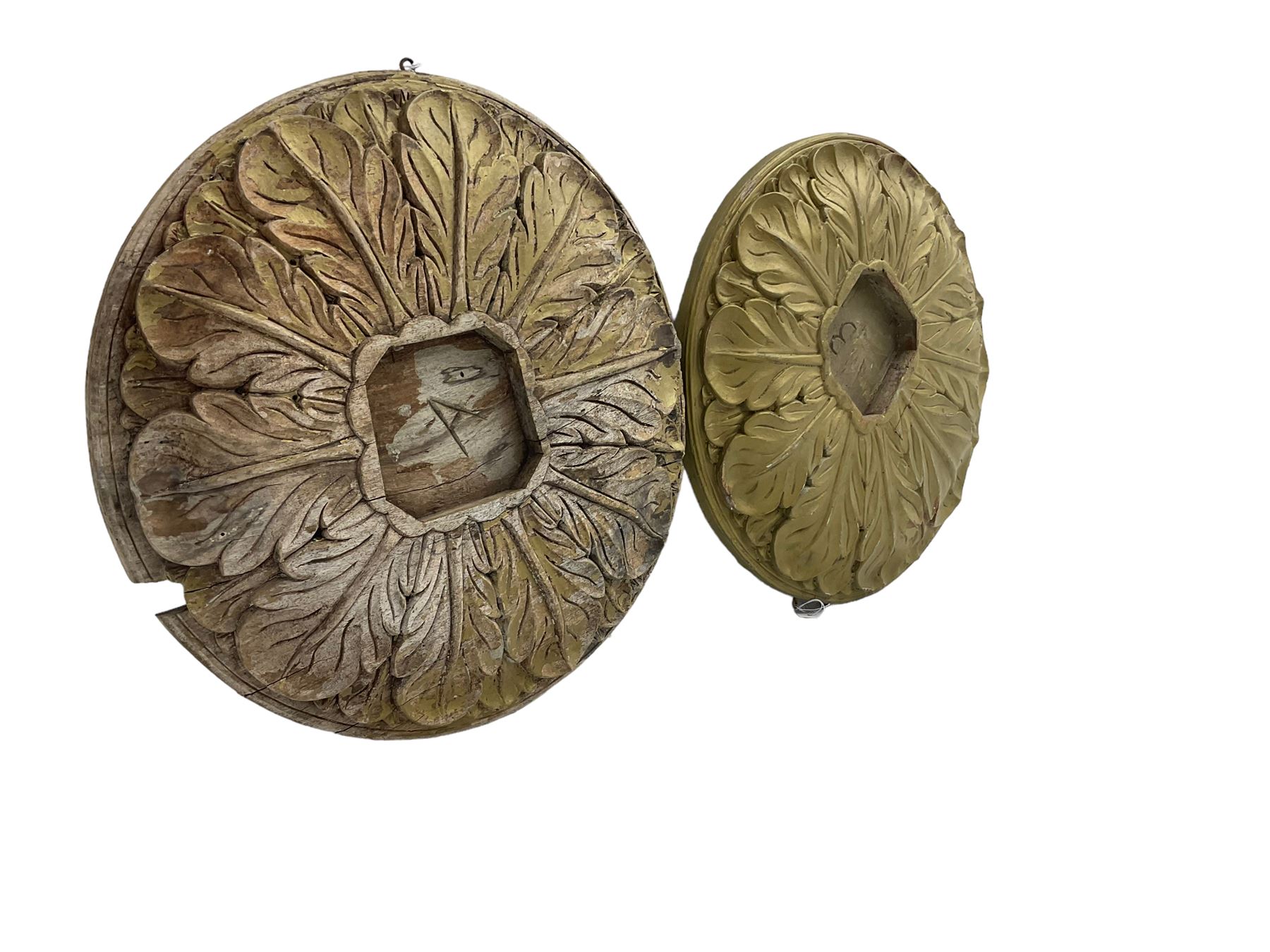 Two 20th century hardwood mounts, circular form carved with extending acanthus leaves