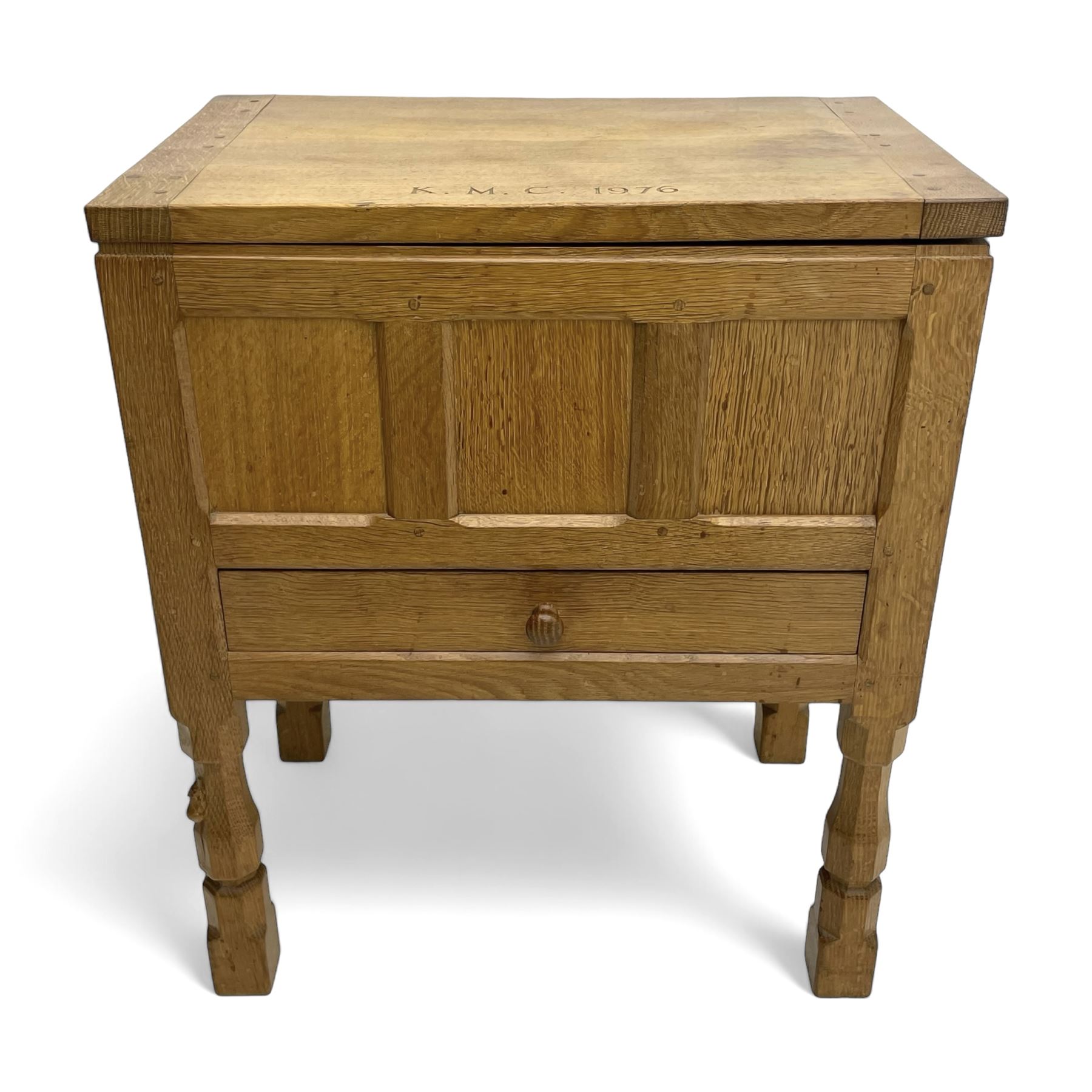 Mouseman - oak work or sewing box, rectangular adzed top inscribed 'L. M. C. 1976' enclosing vacant interior, triple panelled front and double panelled sides, fitted with single drawer, on octagonal supports, carved with mouse signature, by the workshop of Robert Thompson, Kilburn 