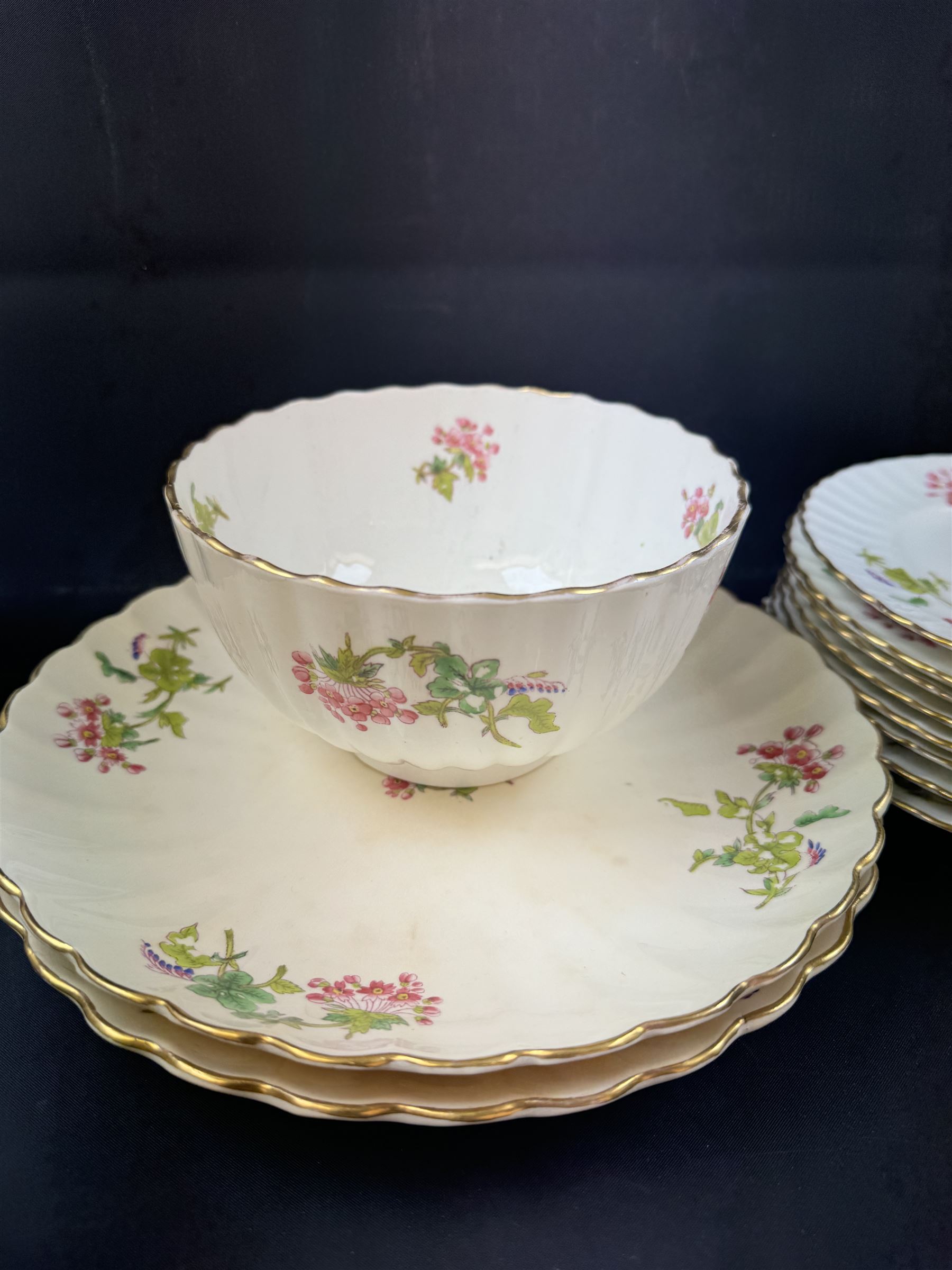 Coalport part tea service, decorated with floral sprigs, including eight cups and saucers, milk jug, eight dessert plates etc  