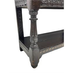  17th century oak buffet or side table, moulded rectangular top over guilloche carved frieze rails and rear upright supports, turned and flute carved front supports united by under tier