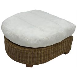 Rattan armchair and ottoman set, pair of armchairs featuring rounded backrests with wide armrests, woven wicker frame with weaving and upholstered seat cushions in off-white fabric with flowing floral pattern (W83 D80 H78cm); matching round ottoman with upholstered cushion on square wooden feet (W65 D65 H37cm)