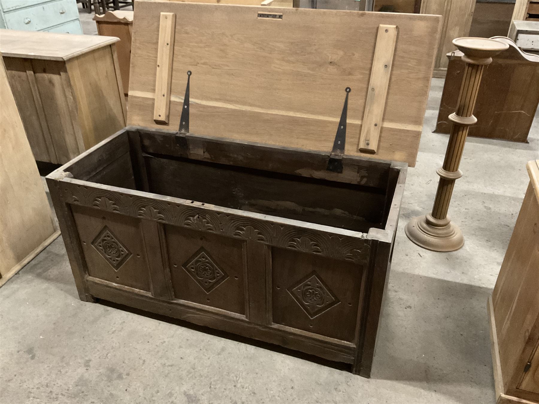 17th century design oak coffer or chest, rectangular hinged top, the frieze carved with lunettes and anthemion leaves, three panels decorated with lozenge and foliage carvings - THIS LOT IS TO BE COLLECTED BY APPOINTMENT FROM THE OLD BUFFER DEPOT, MELBOURNE PLACE, SOWERBY, THIRSK, YO7 1QY