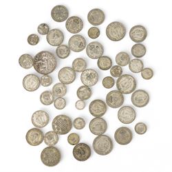 Approximately 400 grams of Great British pre 1947 silver coins, including shillings, halfc...