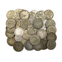 Approximately 590 grams of Great British pre 1947 silver coins, including one shillings, florins or two shillings and halfcrowns