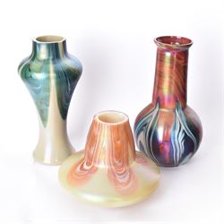 Three Austrian Art Nouveau iridescent glass vases by Rindskopf, all of varying form, each with pulled feather decoration to body, tallest H20.5cm