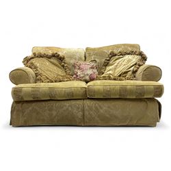 Contemporary two-seat sofa, upholstered in damask fabric with a pale gold floral pattern, ...