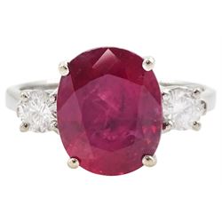 18ct white gold three stone oval cut ruby and round brilliant cut diamond ring, hallmarked, ruby approx 4.30 carat