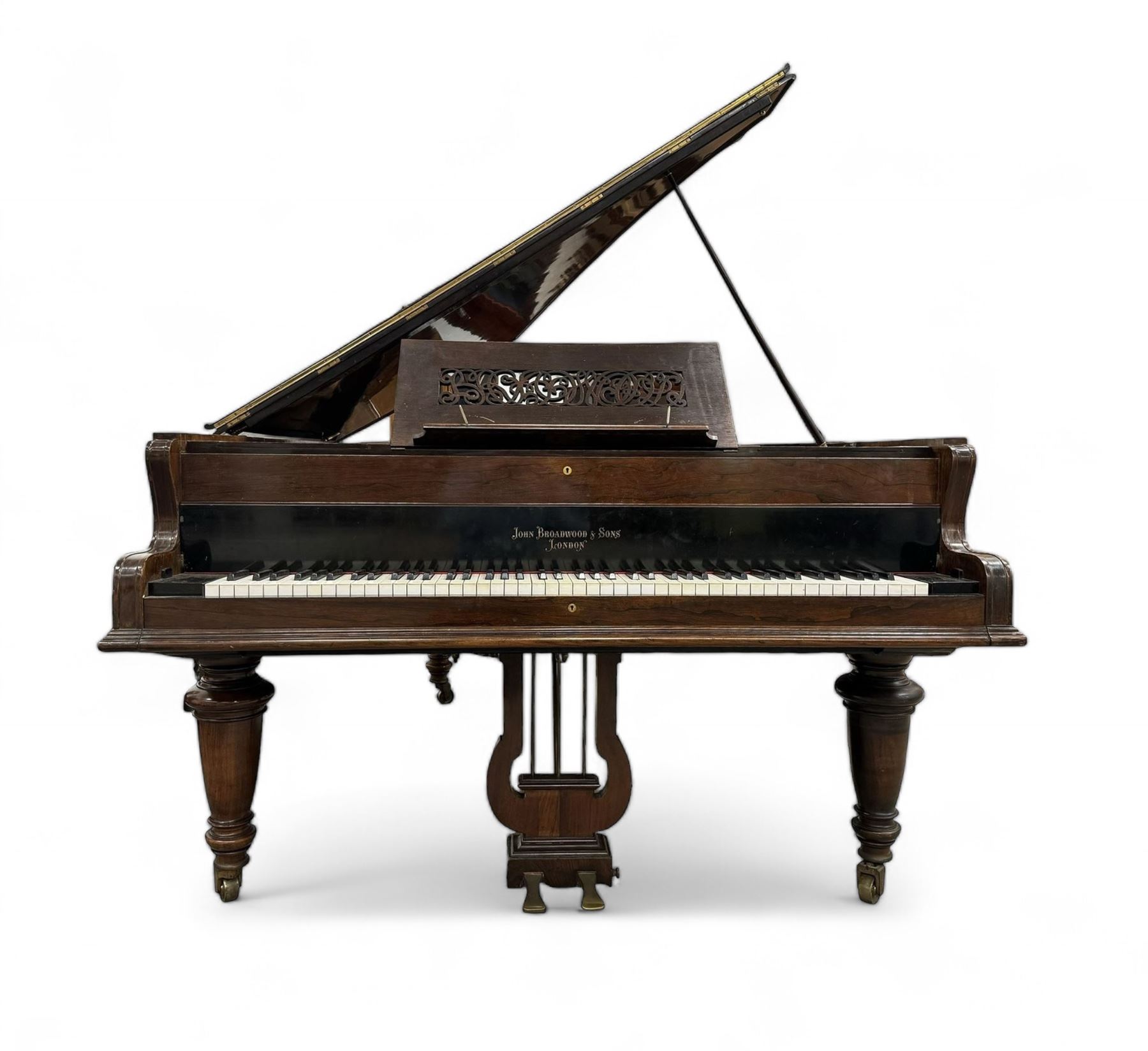 John Broadwood & Sons London - 19th century rosewood grand piano serial  No 47356 (1900-1910) overstrung cast iron frame with 88 notes, 7 octaves, Lyre with sostenuto and una-corda pedals, split-hinged key fall board and fretted music desk, case raised on three taper turned legs with brass castors, original stringing, felt, hammers, dampers and grand roller action.

This item has been registered for sale under Section 10 of the APHA Ivory Act