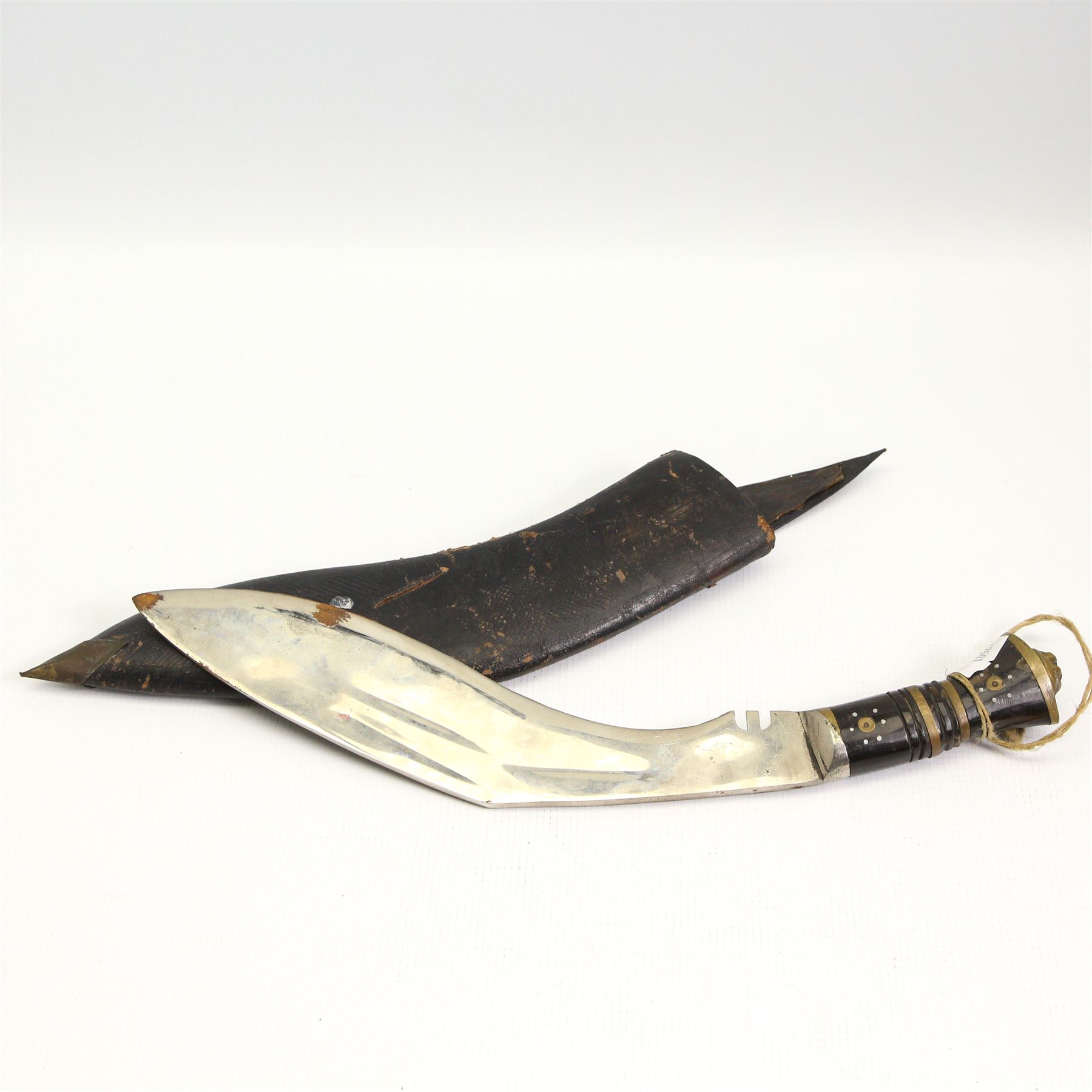 Two 20th century Indian swords with engraved blades, Kukri knife and an Indian knife in carved wood sheath (4)