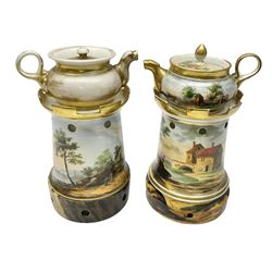  Two 19th century continental teapots and warmers, each teapot upon a cylindrical warming base, hand printed with landscapes, largest H22cm