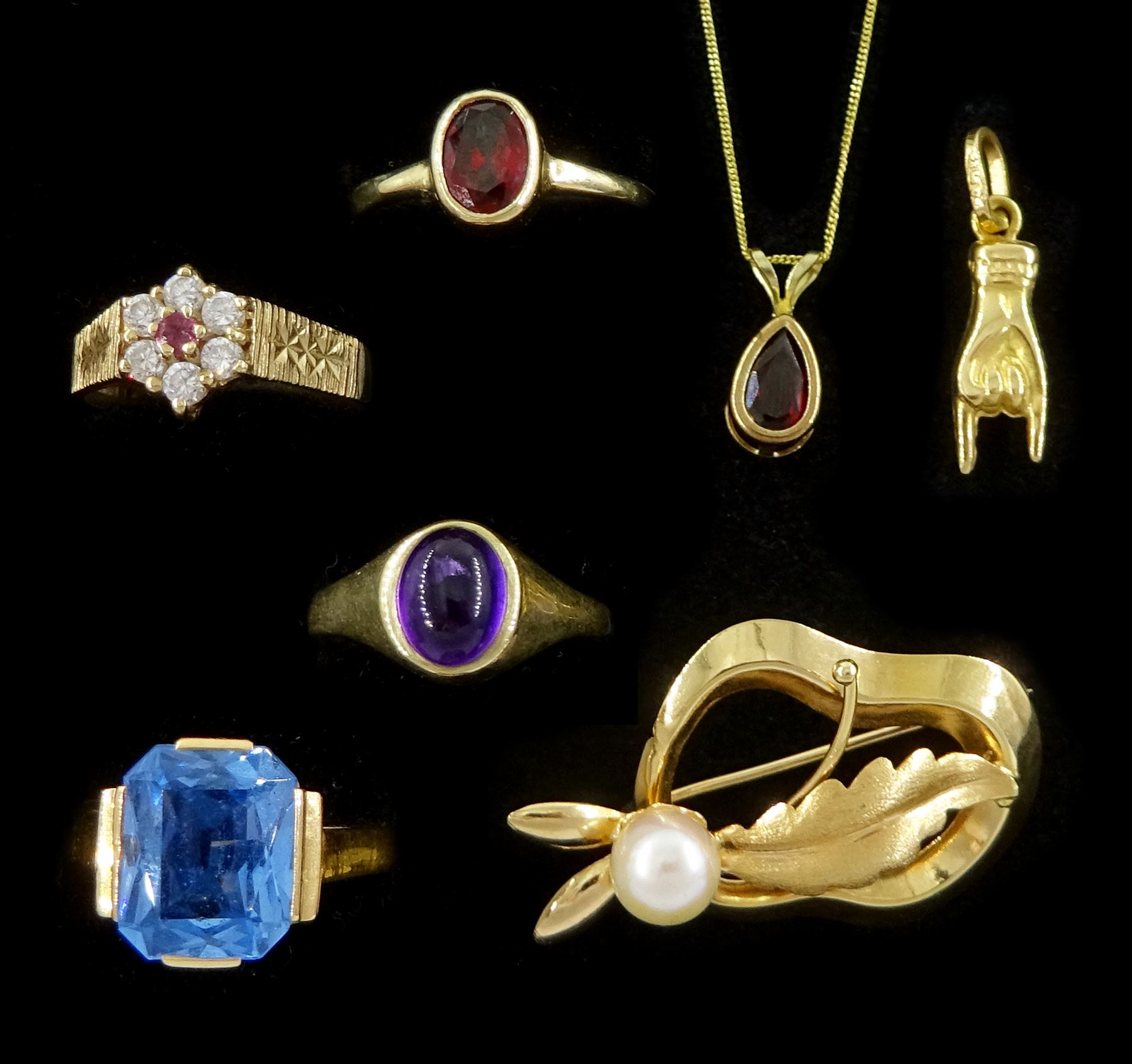 Swedish 20ct gold single stone blue topaz ring, stamped 20K and hallmarked, three 9ct gold stone set rings including amethyst, garnet and pink sapphire and cubic zirconia, 9ct gold garnet necklace, gold brooch and hand pendant, both 18ct