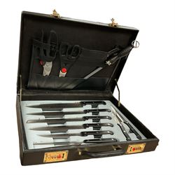 Bravo cased knives set with combination lock containing kitchen knives and utensils