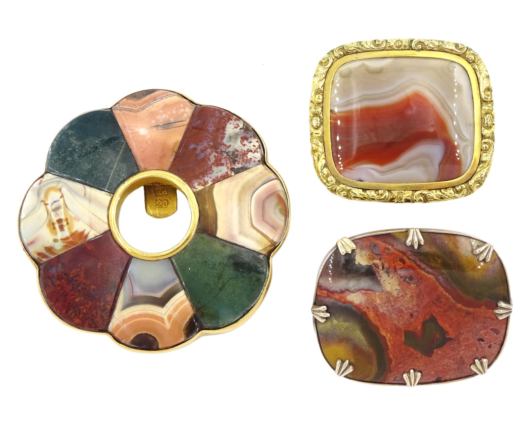 Early 20th century 19ct gold hardstone buckle and two gold-plated agate brooch and one other brooch