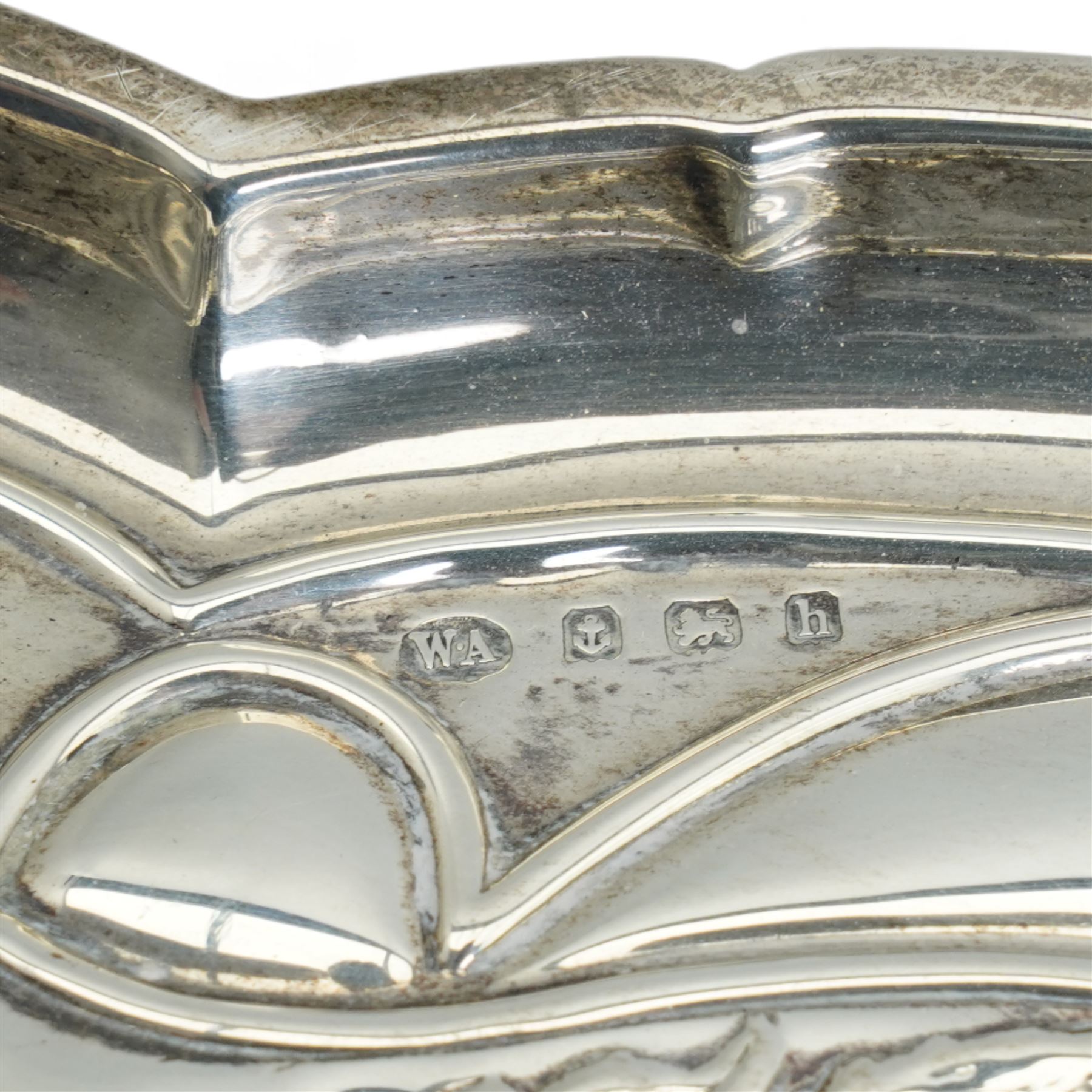 Edwardian Art Nouveau silver dressing table tray of lobed oval design with embossed decoration and cartouche W31cm Birmingham 1907 Maker William Adams Ltd 