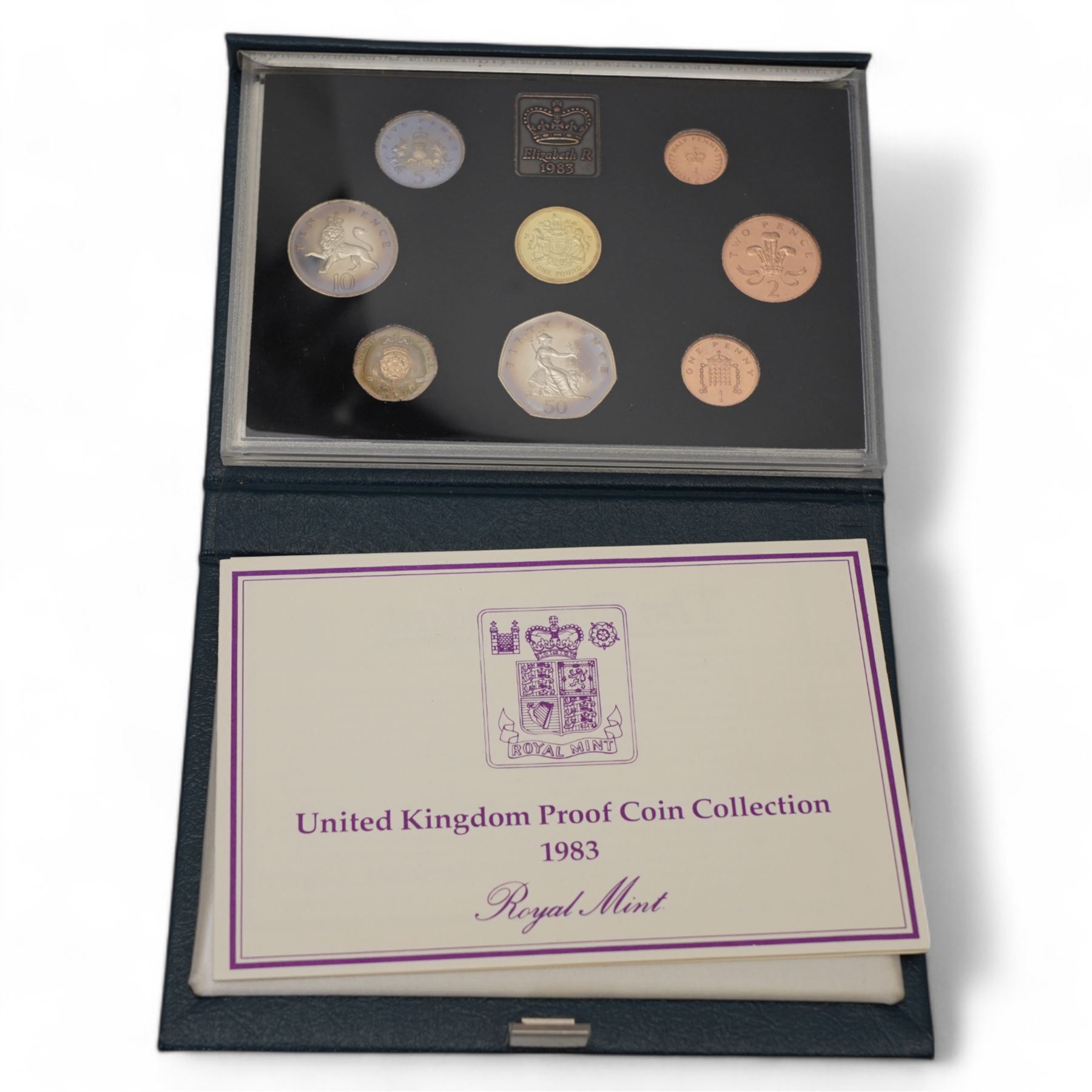 Mostly commemorative coinage, including various Queen Elizabeth five pound coins with two brilliant uncirculated 1999 in card folders, United Kingdom 1983 proof coin collection cased with certificate, commemorative crowns etc