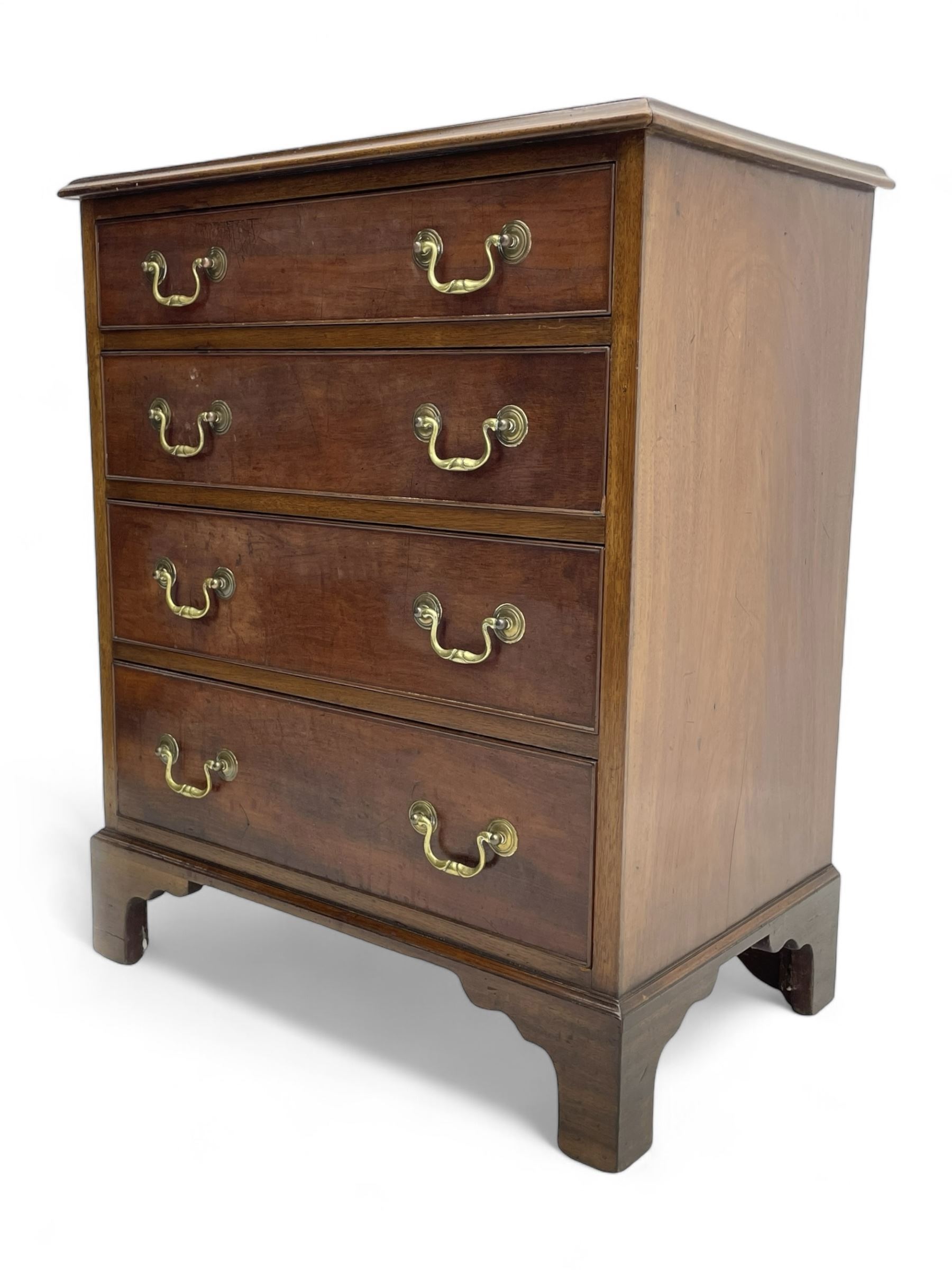 Small Georgian and later mahogany chest, moulded rectangular top over four long cock-beaded drawers, on bracket feet