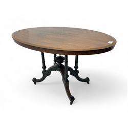 Victorian inlaid walnut loo table, the oval top inlaid with scrolls and stringing, on parc...