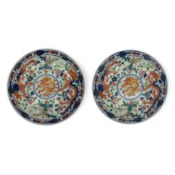 Pair of Chinese 'Dragon & Phoenix' porcelain saucers, centrally painted with a five claw d...