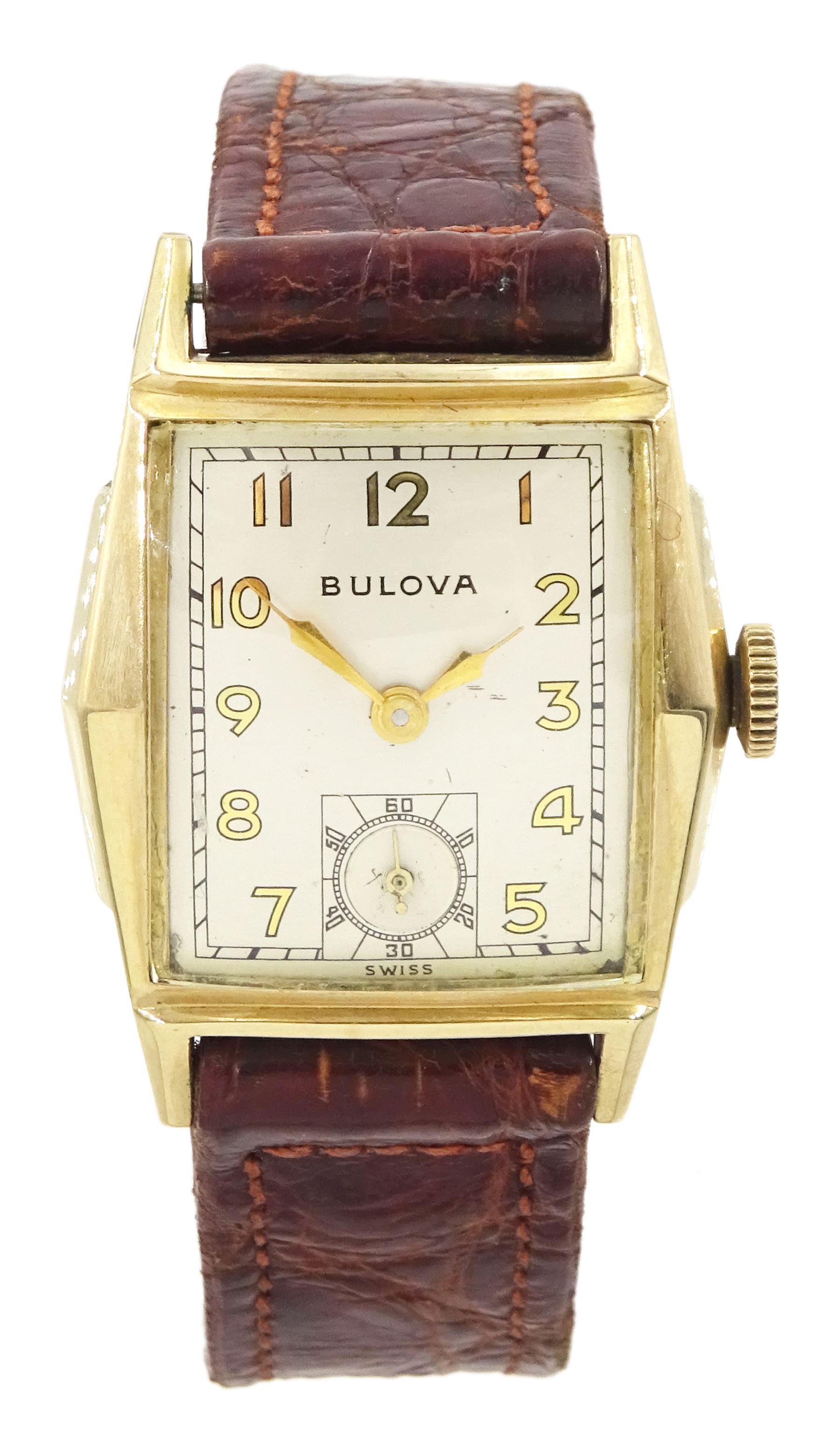 Bulova gentleman's gold-plated and stainless steel manual wind wristwatch,  silvered dial with subsidiary seconds dial, on brown leather strap, boxed