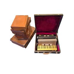 Collection of leather cases and a Contessa IV M accordion 