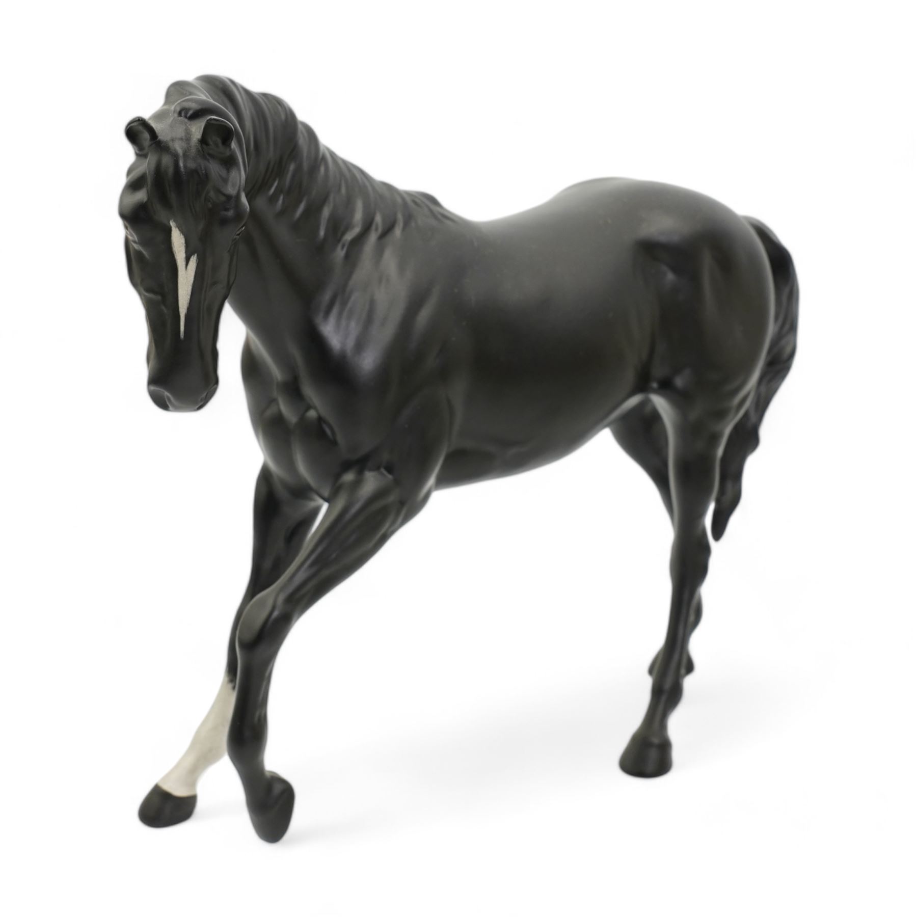 Group of Beswick horses and donkeys, including Connemara pony, a grey gloss stallion and foal, Black Beauty, another foal, two shire horses and two donkeys 