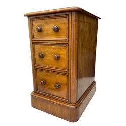 Pair of Victorian figured mahogany pedestal chests, rectangular form with rounded front corners, moulded top over three drawers with applied mouldings and turned handles, on moulded plinth base