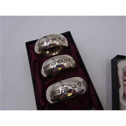 Set of six modern silver napkin rings, hallmarked London 2000, makers mark WW, together with a modern silver pin dish, hallmarked Hugh Crawshaw, Sheffield 2000, both boxed