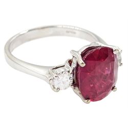 18ct white gold three stone oval cut ruby and round brilliant cut diamond ring, hallmarked, ruby approx 4.30 carat