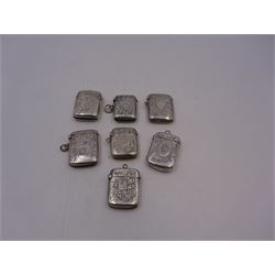 Seven early 20th century silver vesta cases, all of typical form, engraved with foliate and scrolling details, all hallmarked