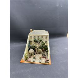 Mixed medium sculpture of house and garden, with makers mark beneath, H15cm