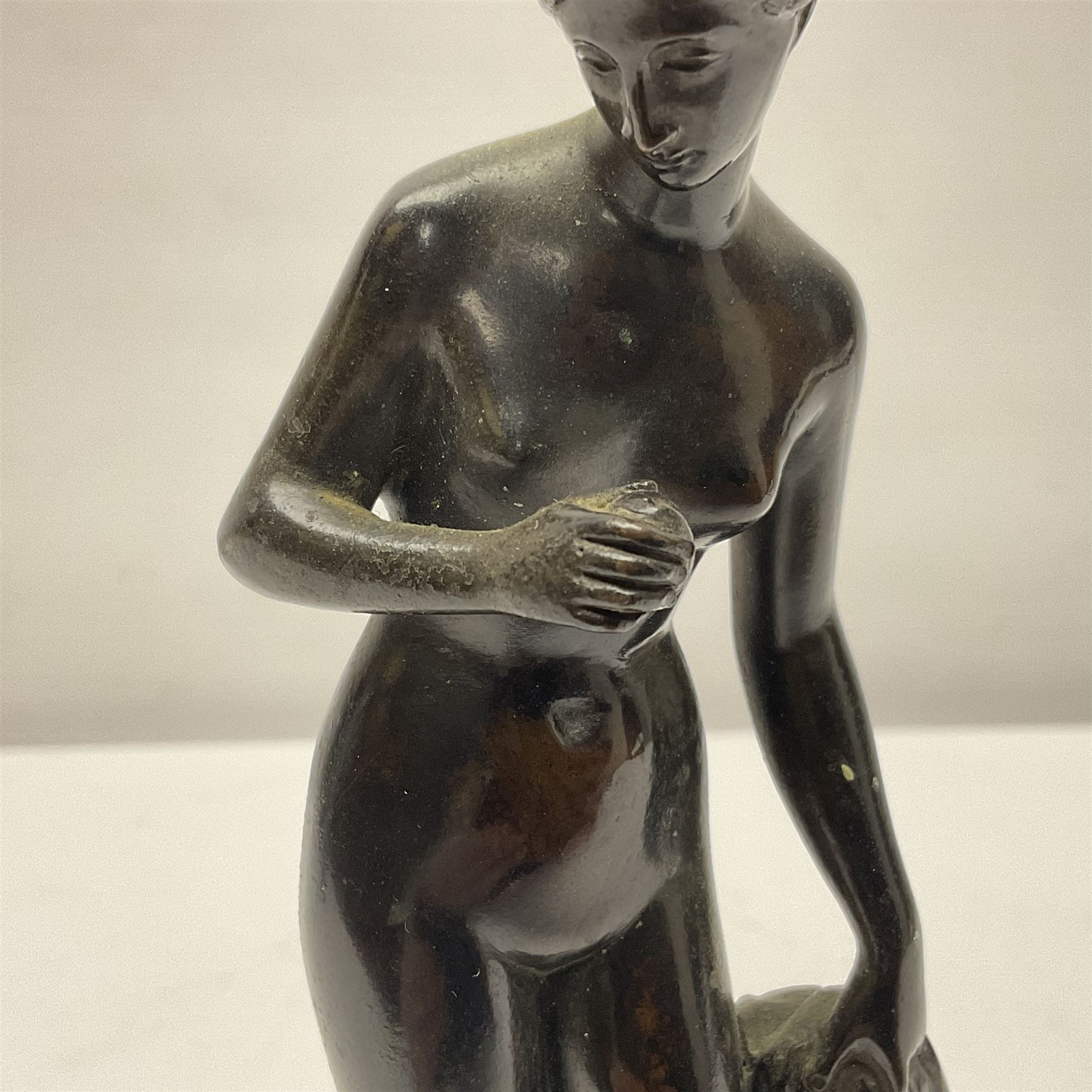 Bronze neo classical figure, modelled as a nude female, upon a green marble base, H20.5cm