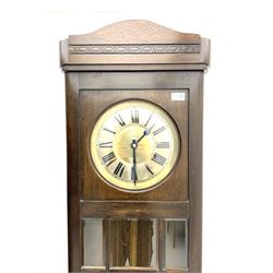 Early 20th century oak longcase clock, brass weight driven, bevelled glass viewing panes