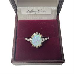 Silver opal and cubic zirconia cluster ring, stamped 925, boxed 