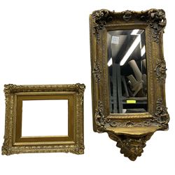 Rococo style gilt mirror with a cherub pediment, together with gilt frame (2)