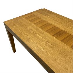 Contemporary oak dining table, rectangular top with inlaid walnut central strip, on square tapering supports 