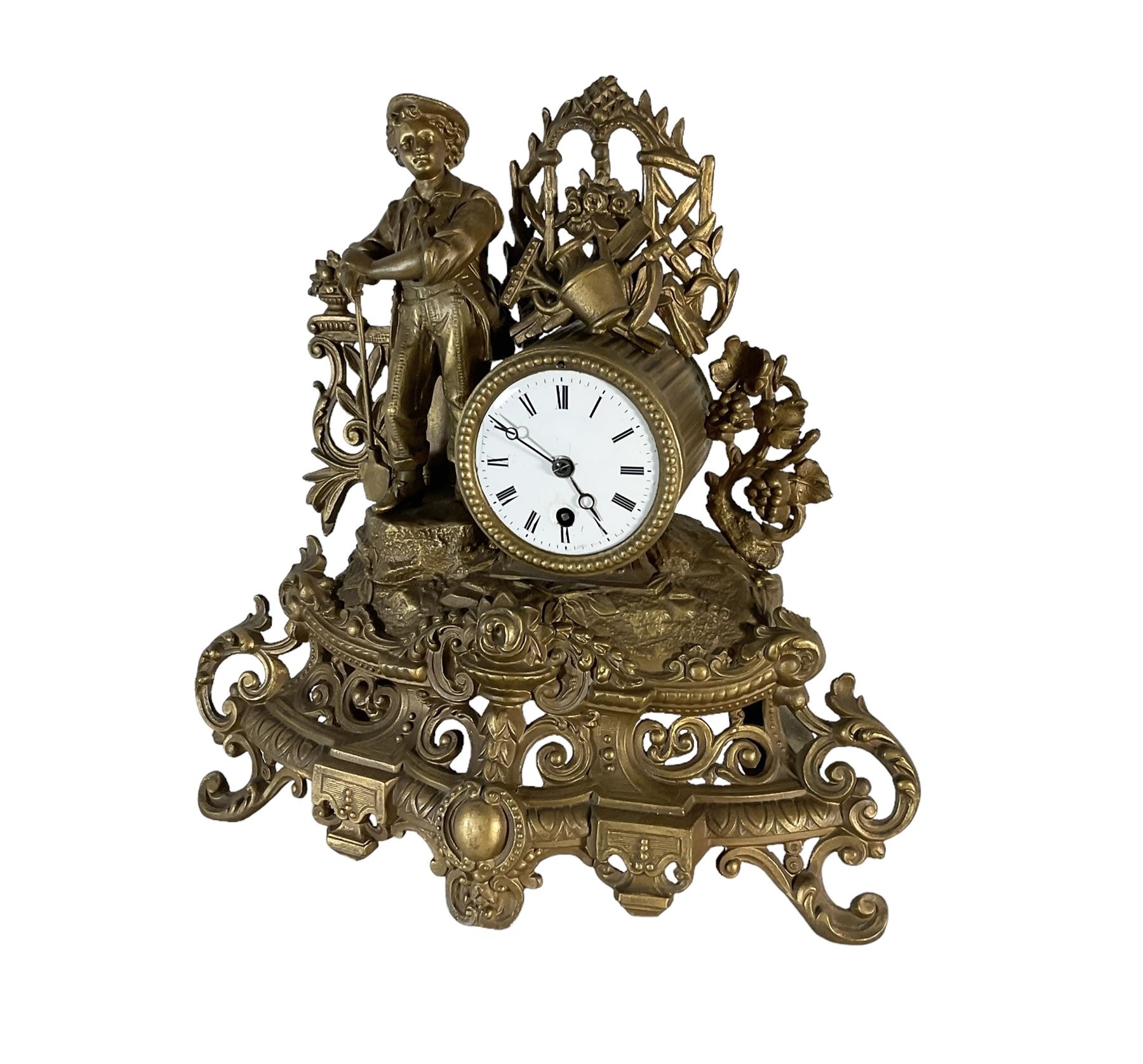 19th century - French gilt spelter 8-day timepiece mantle clock, with an ornate rococo case on splayed feet, drum movement with a cast figure of a gardener, flowers and gardening tools, white enamel dial with Roman numerals, minute markers and matching steel moon hands. With pendulum.   