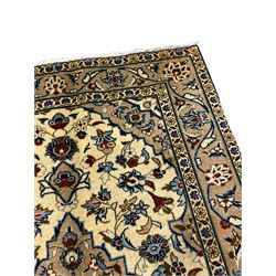 Small Persian Kashan rug, the field decorated with central medallion surrounded by stylised plant motifs, guarded border decorated with floral motifs and trailing leafy branch