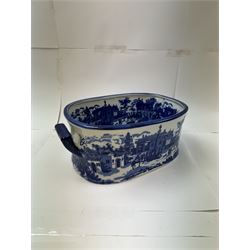 Pair of Victorian style blue and white footbaths, each with twin lug handles and transfer print decorated with city scape, H14cm