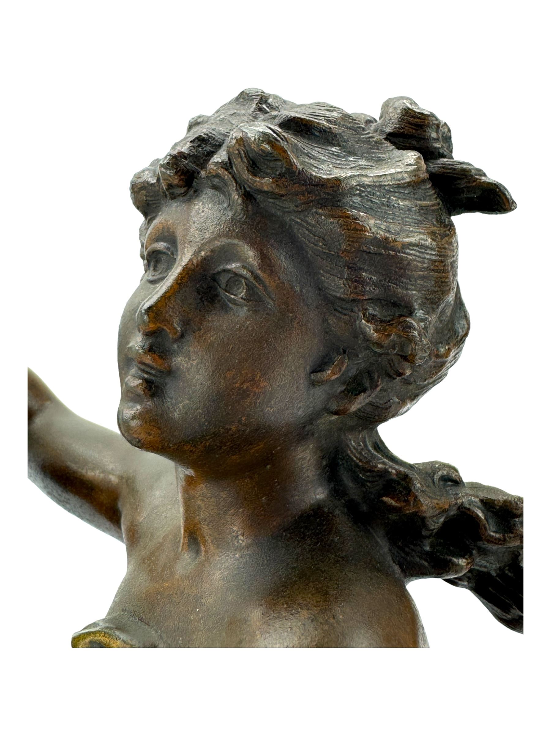 After L & F Moreau - Spelter table lamp in the form of a female figure next to a pedestal on circular naturalistic base H55cm