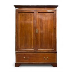 Edwardian inlaid mahogany double wardrobe, panelled doors enclosing sliding trays and hanging rail, fitted with single drawer to base