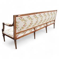 Late 19th century Swedish beech-framed settee, upholstered in cream fabric with trailing foliate pattern decorated with flowers, carved and moulded frame, scroll carved arm terminals on shaped moulded arm supports, on turned and fluted feet