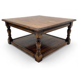 Square elm coffee table, square ovolo-moulded top with fruitwood band, turned supports united by undertier 