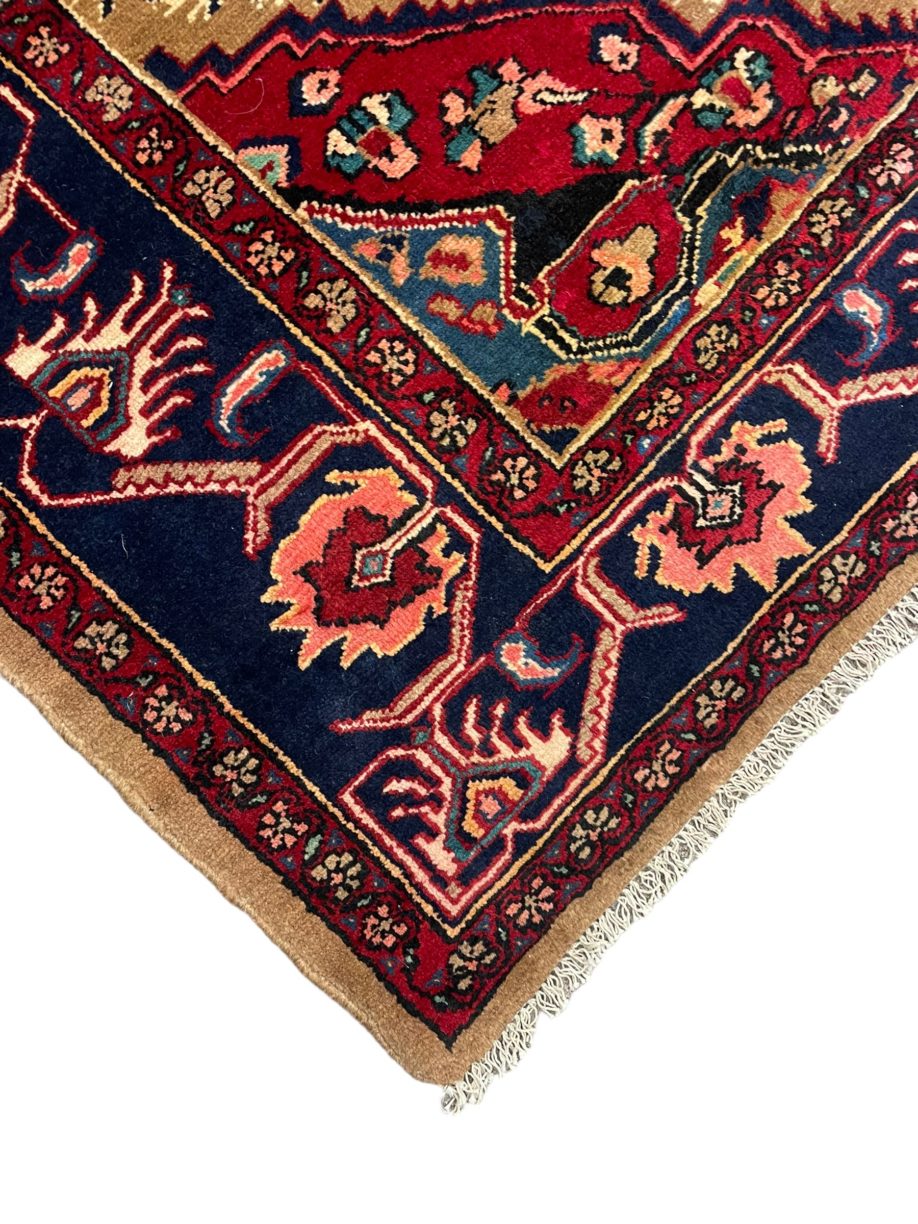 North West Persian Bidjar rug, large floral design shaped pole medallion on a brown field decorated with lattice pattern, the border decorated with trailing branch and stylised plant motifs